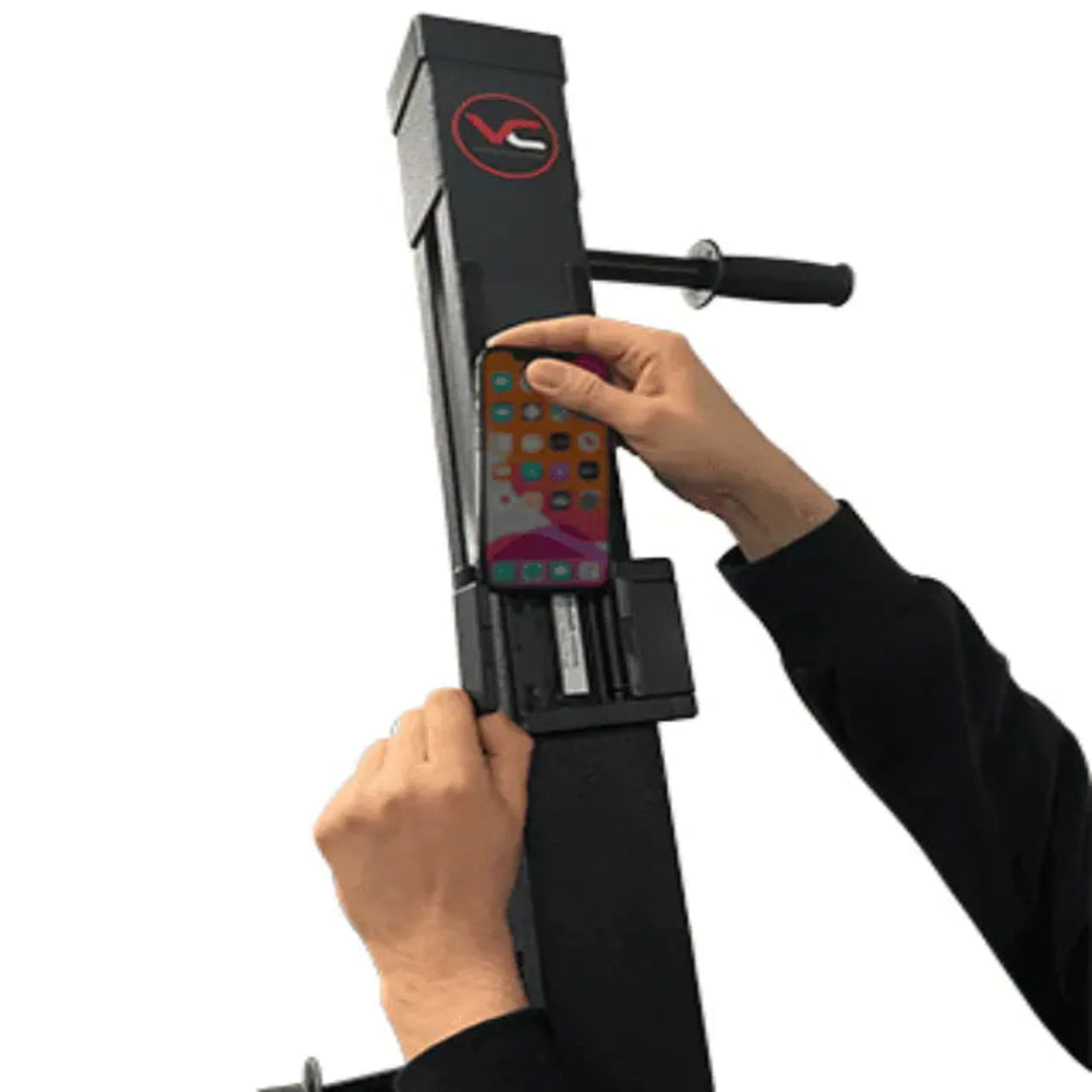 Person holding a black electronic device with a colorful keypad on a white background