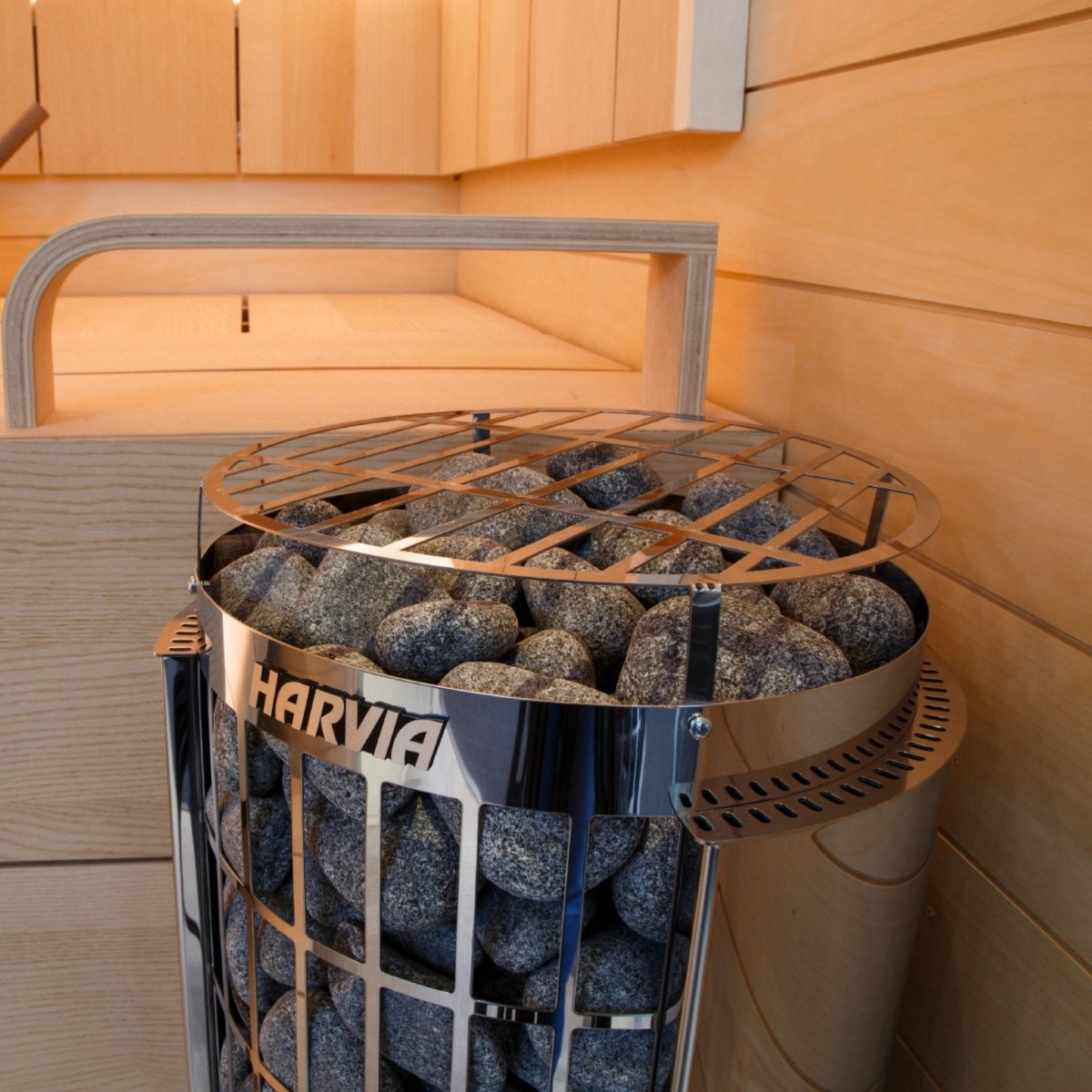 Harvia Cilindro PC90 electric sauna heater positioned against wood sauna walls