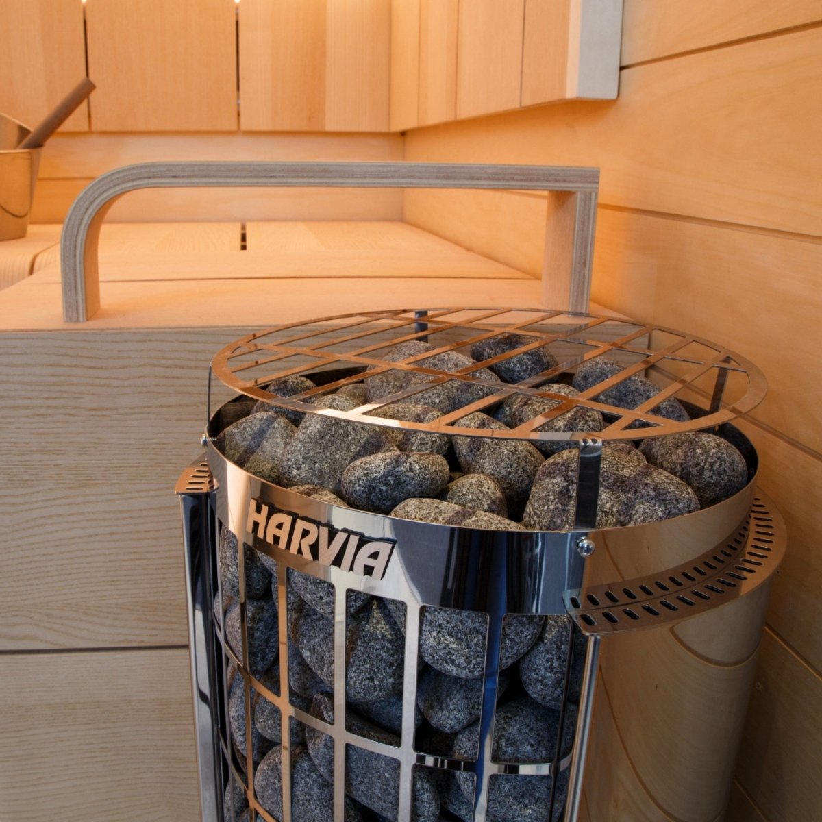 Harvia Cilindro PC90E sauna heater shown inside wood sauna