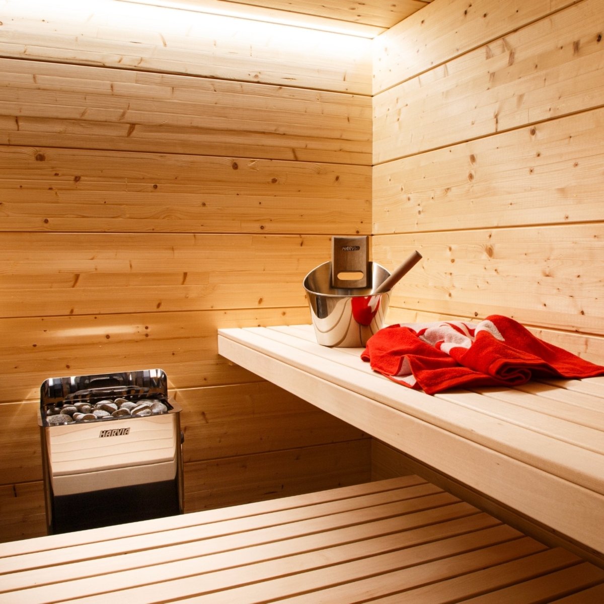 Harvia The Wall SWS60 electric sauna heater installed inside wood sauna