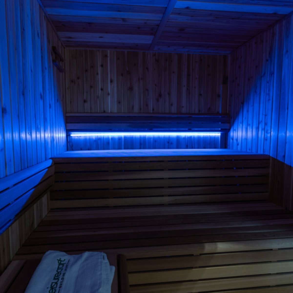 Leisurecraft 72-inch Lighting Set installed in a cedar sauna featuring blue LED ambient lighting