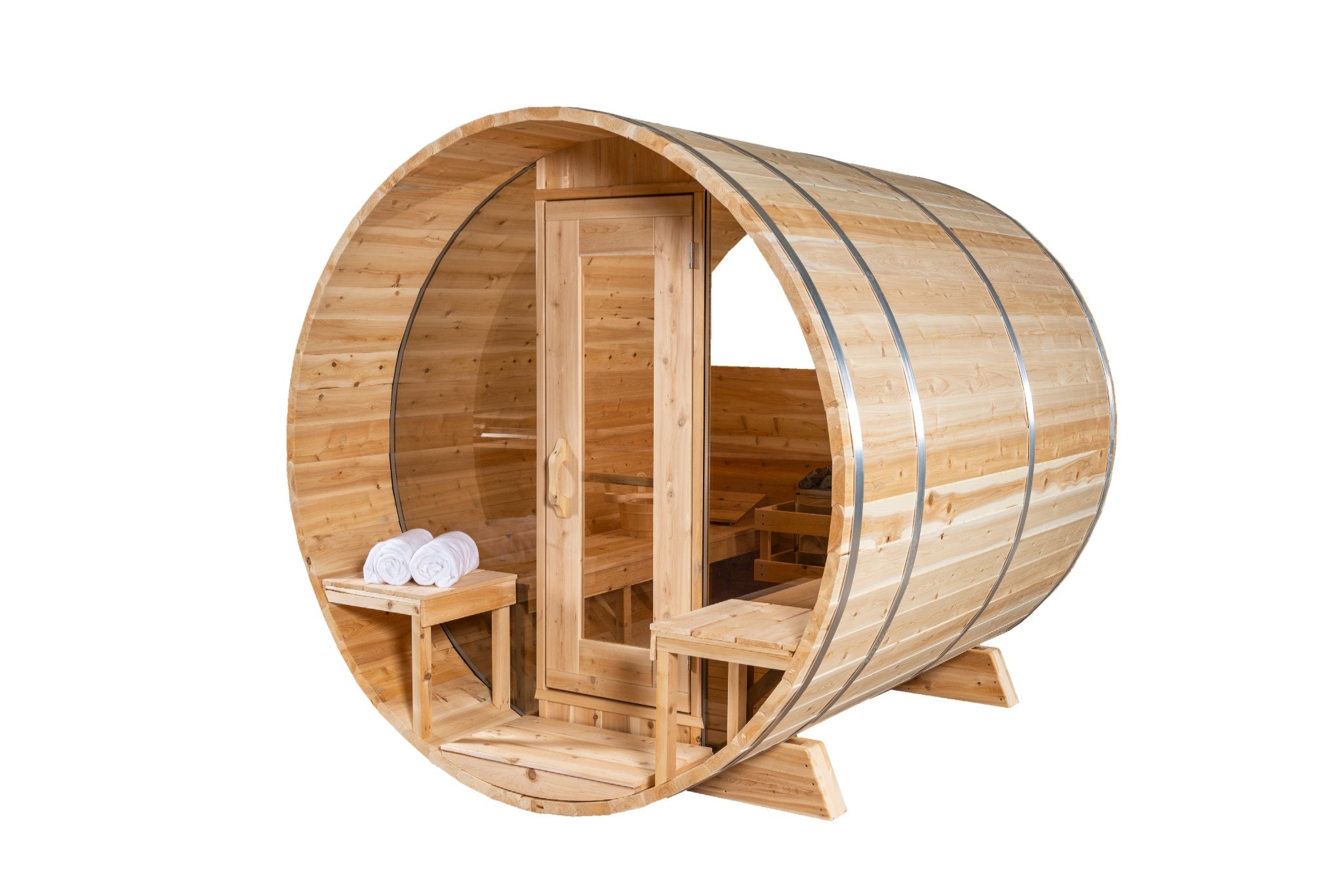 Leisurecraft Serenity MP Barrel Sauna interior showcasing smooth cedar benches, glass door, and natural wood grain texture with warm inviting tones.