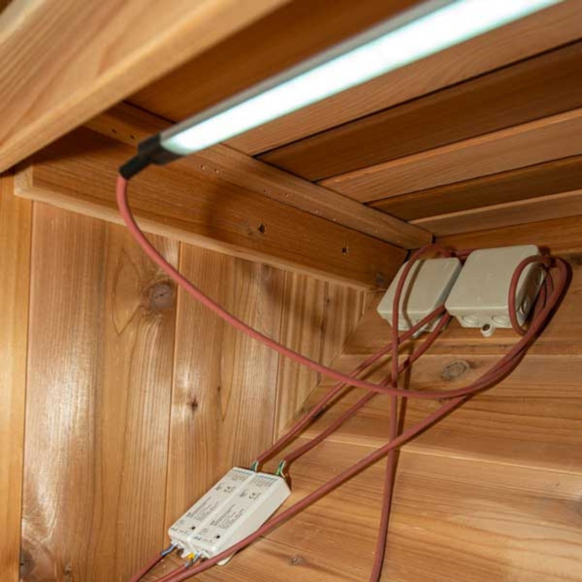 Leisurecraft single bench set showing mounted fluorescent light fixture and concealed electrical wiring