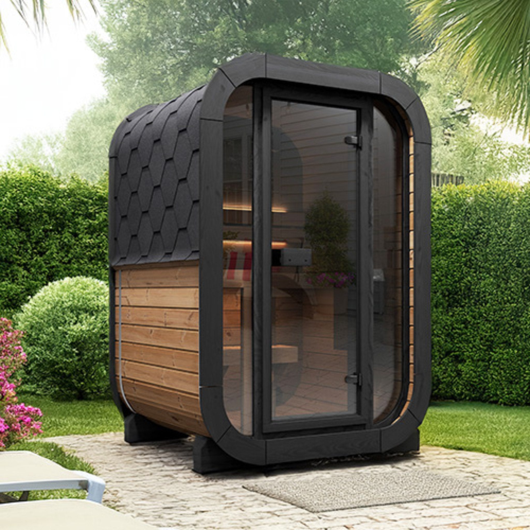 Saunalife CL3G sauna with glass front in a garden setting.