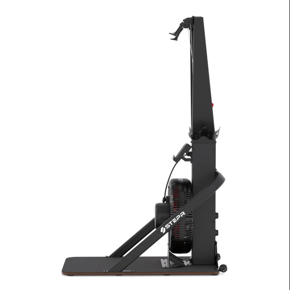 Athlete using STEPR Ski XL Adaptive Ski Erg vertical climber fitness machine in modern gym setting