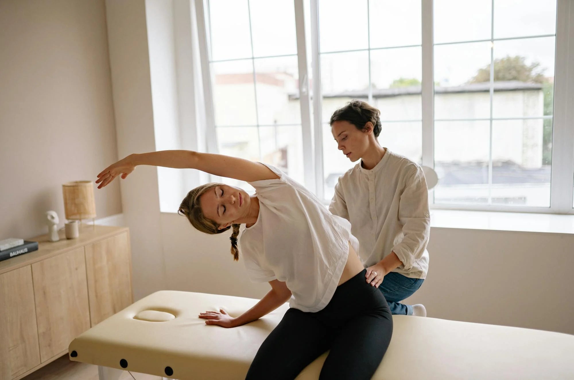 Personalized wellness consultation with practitioner guidance helping an individual explore wellness options and create a more intentional wellness journey.