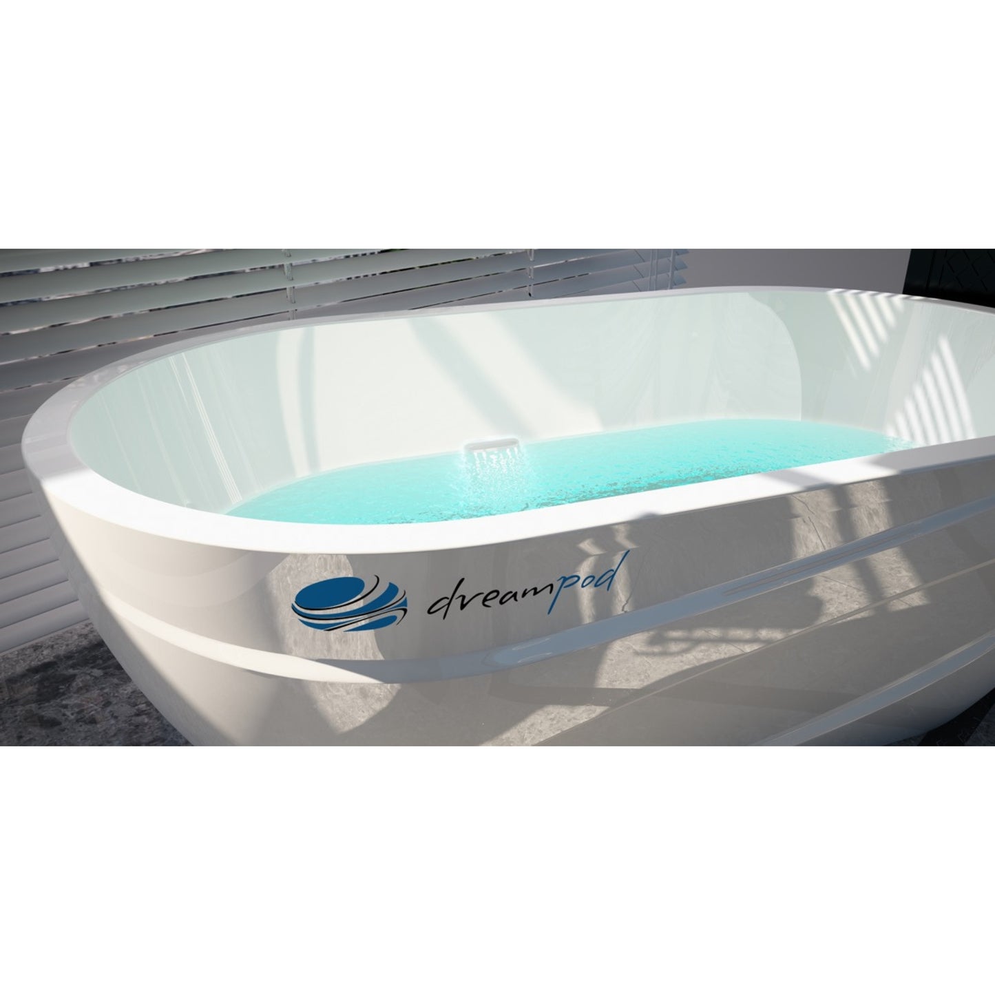 Dreampod ice bath with sleek white exterior, filled with clear blue water, placed outdoors near a wall