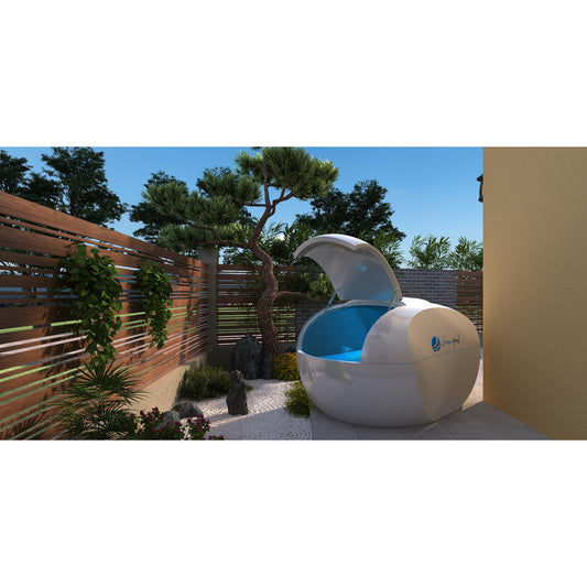 Modern egg-shaped outdoor pool with blue interior and canopy cover, surrounded by wooden fencing and trees in a backyard setting