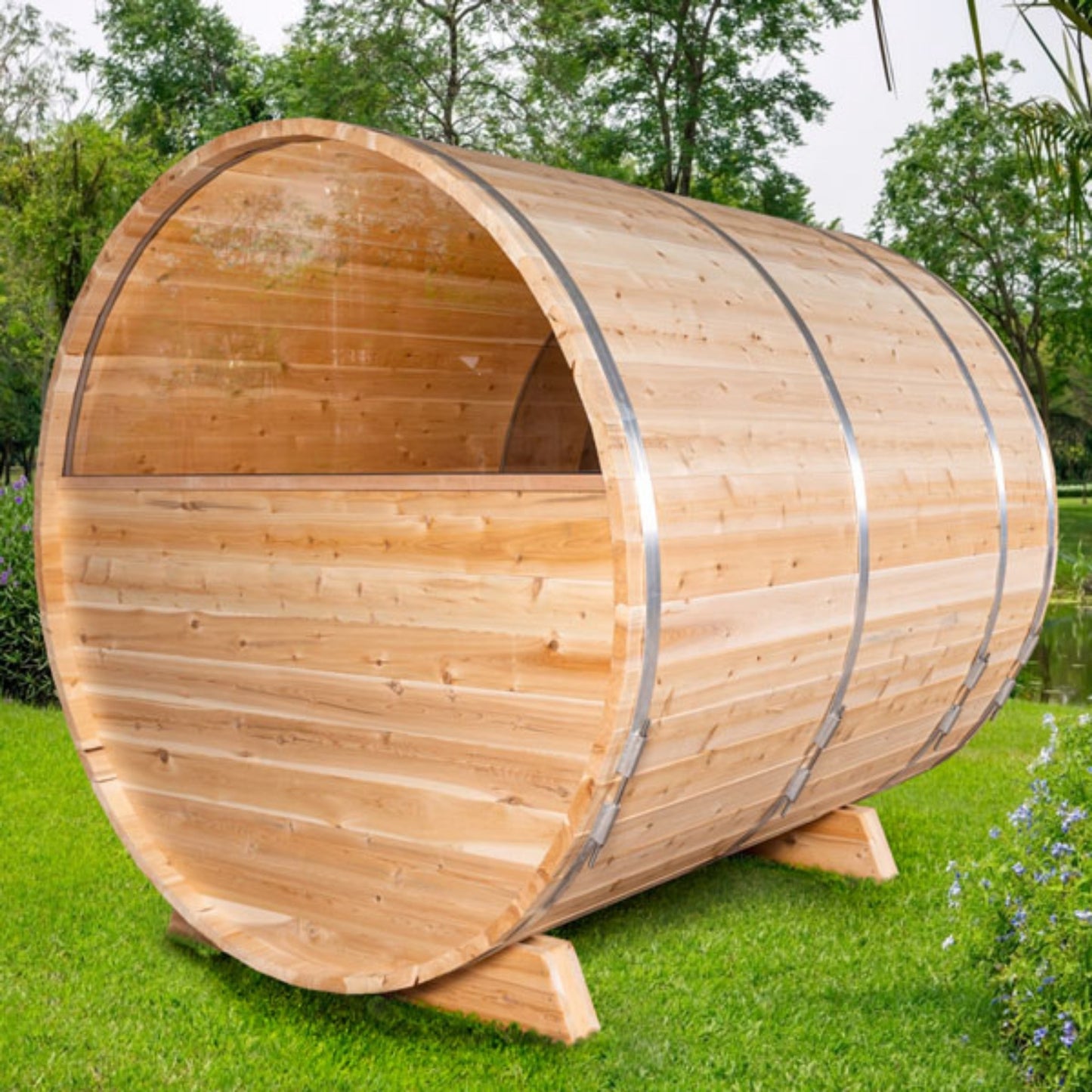 Wooden barrel sauna rear view showing curved cedar paneling on a grassy outdoor area