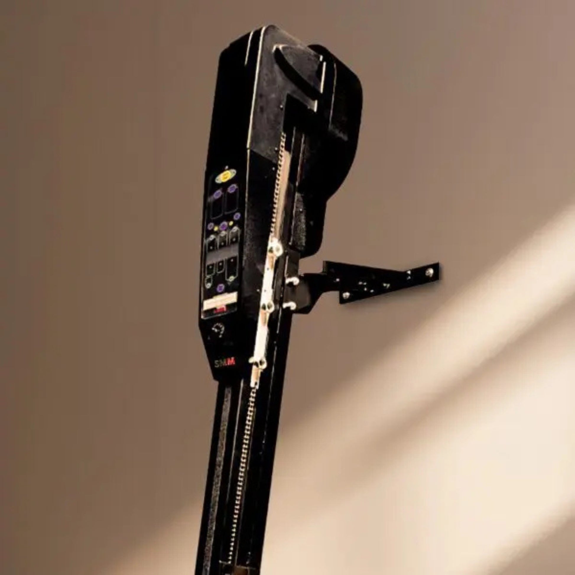 VersaClimber H/HP vertical climbing machine digital console close-up, showing detailed control buttons and metrics display, set against a neutral beige background