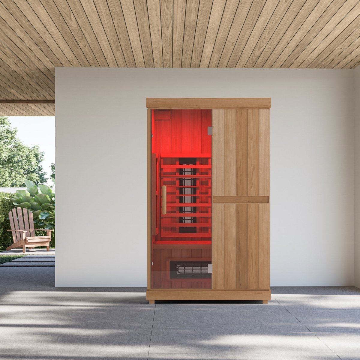 Front view of Finnmark FD-2 infrared sauna glowing with red light through the glass door.