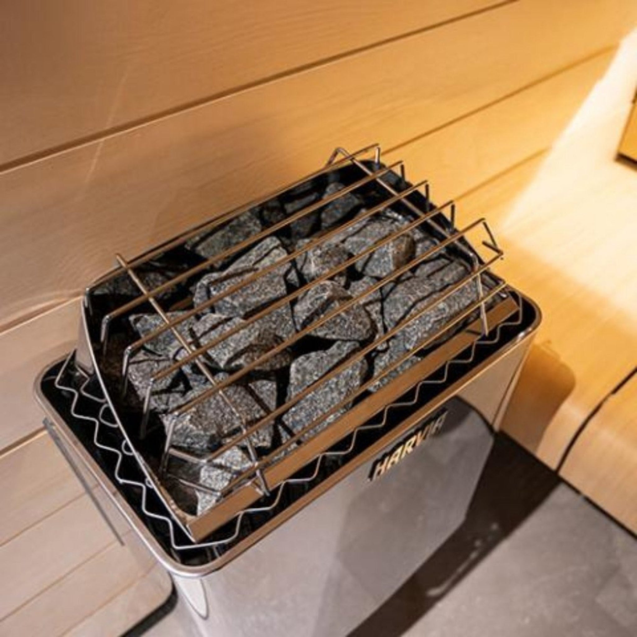 Harvia KIP60W sauna heater top view showing sauna stones inside heater