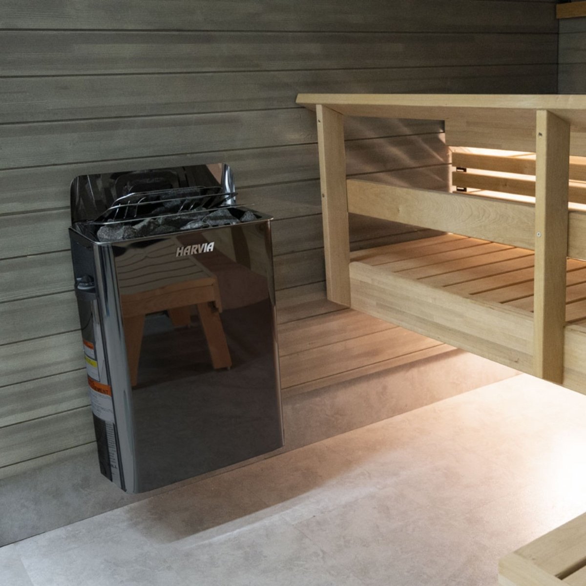 Harvia The Wall SW60 sauna heater installed inside wood sauna