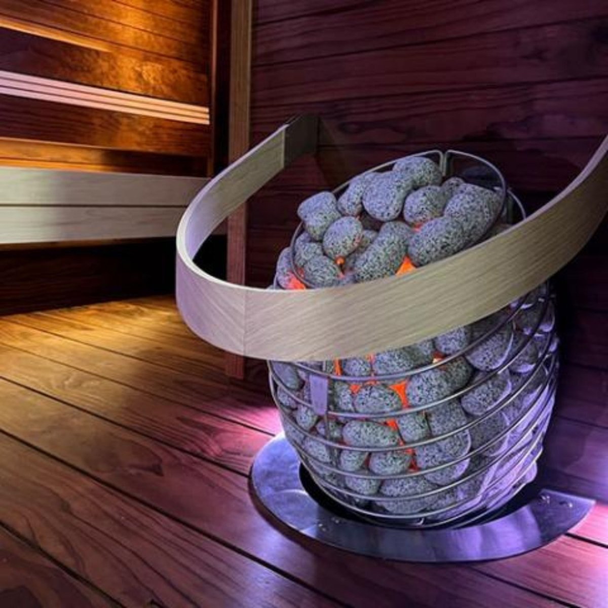 HUUM DROP 4.5 sauna heater with circular safety rail and stones