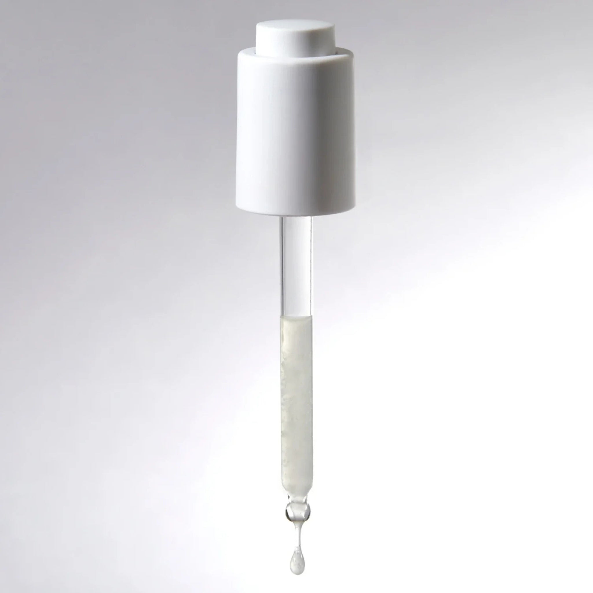 Two bottles of iRestore 3-in-1 Hair Growth Serum displayed together