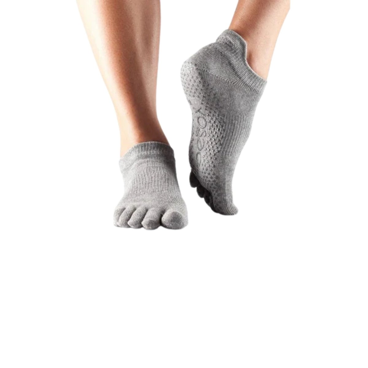 Angled view of Jumpsport gray grip socks with reinforced toe design
