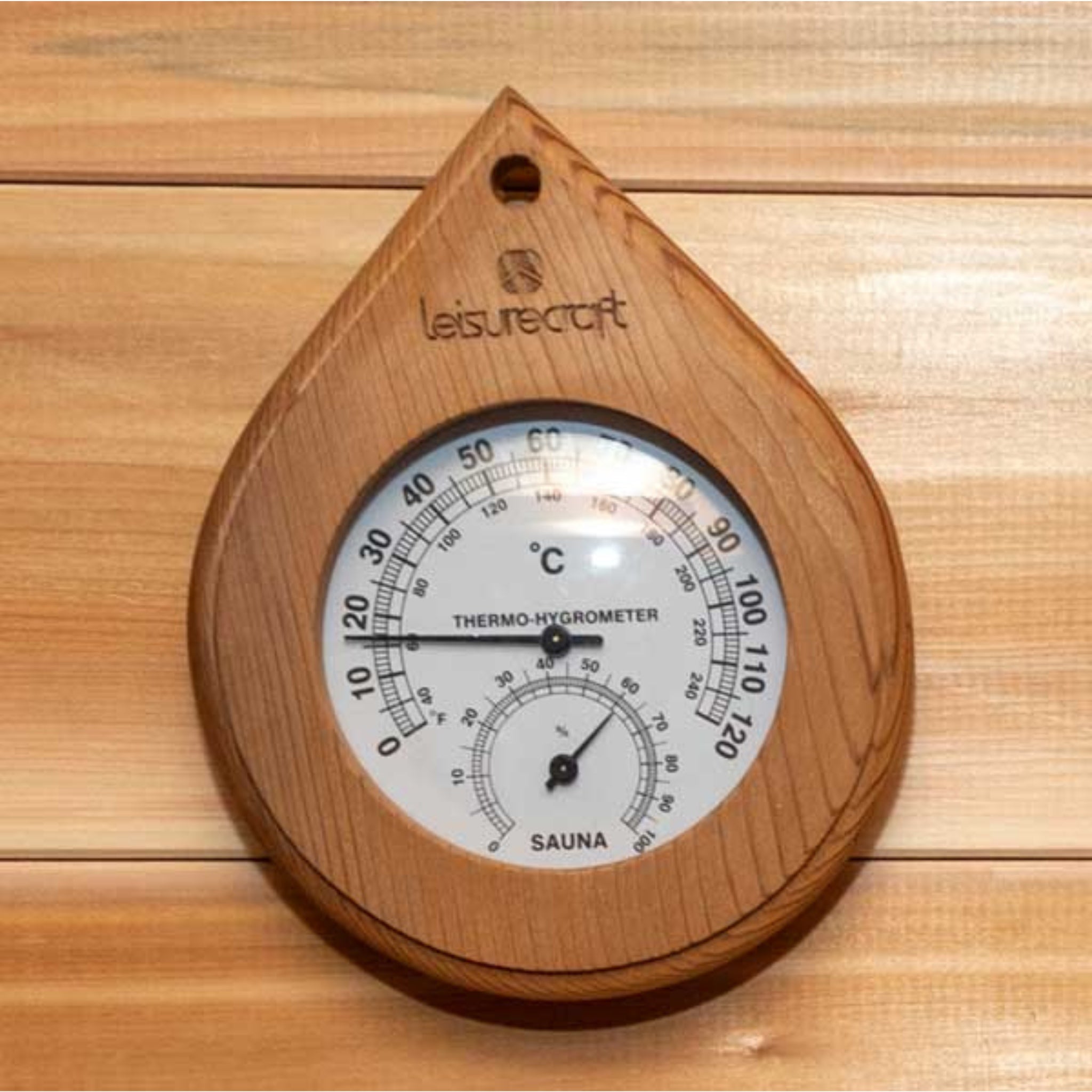 Leisurecraft Cedar Sauna Thermometer with round dial set in a teardrop-shaped cedar wood frame