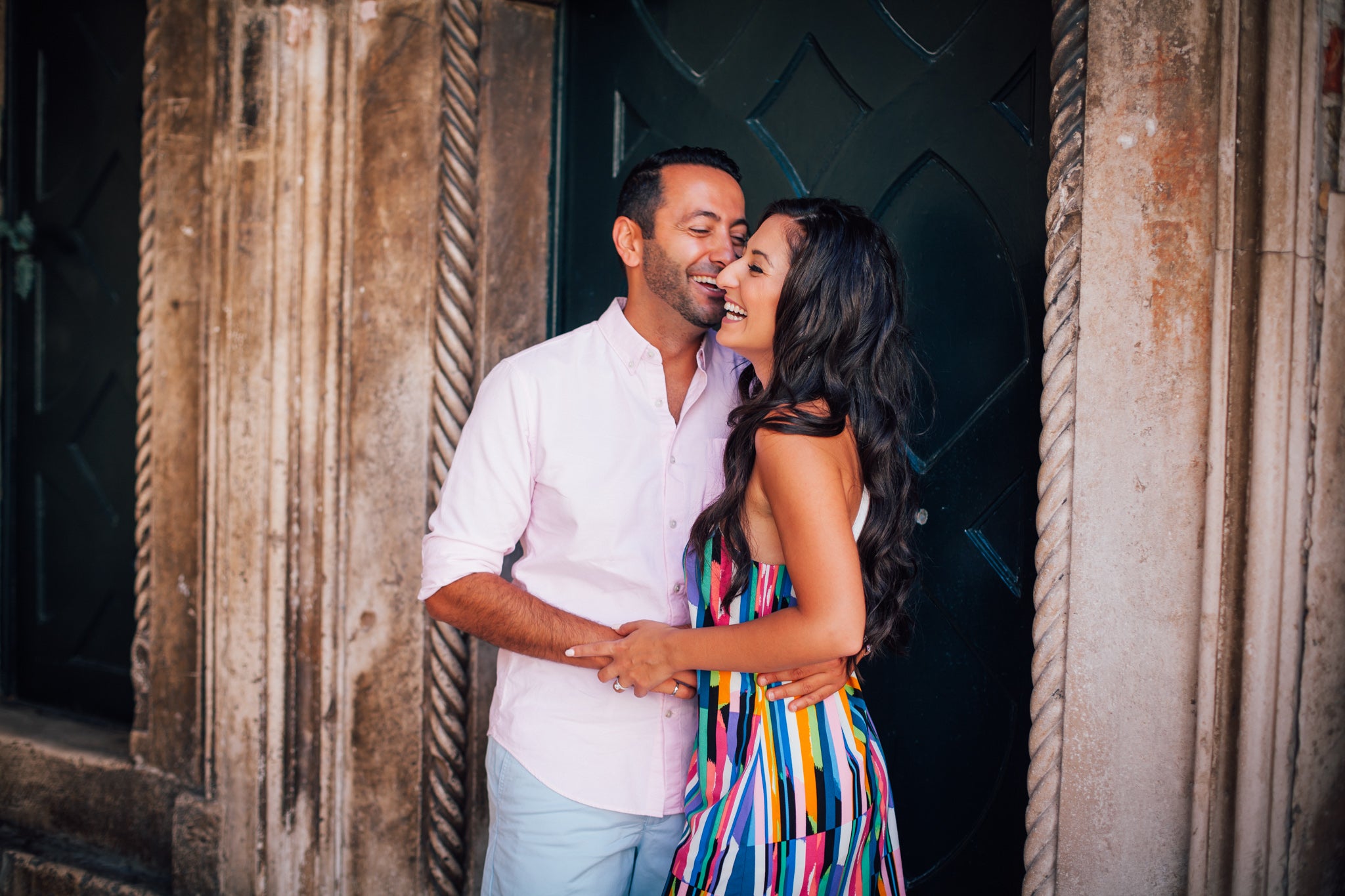 Pedram and Tanya Beheshti sharing a joyful moment together as the founders of My Energy Flow wellness company