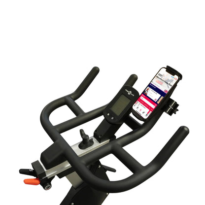 Power Plate REV bike handlebar setup with smartphone securely mounted beside console