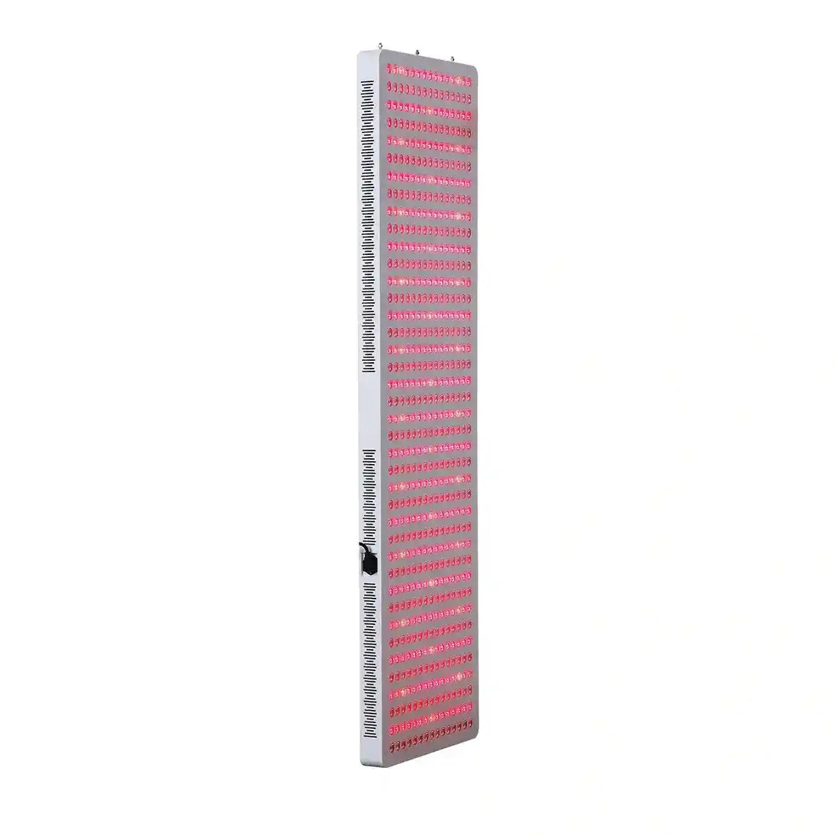 Angled view of the REDDOT RDPRO3000-FS8 Ultra full body red light therapy panel with LEDs on