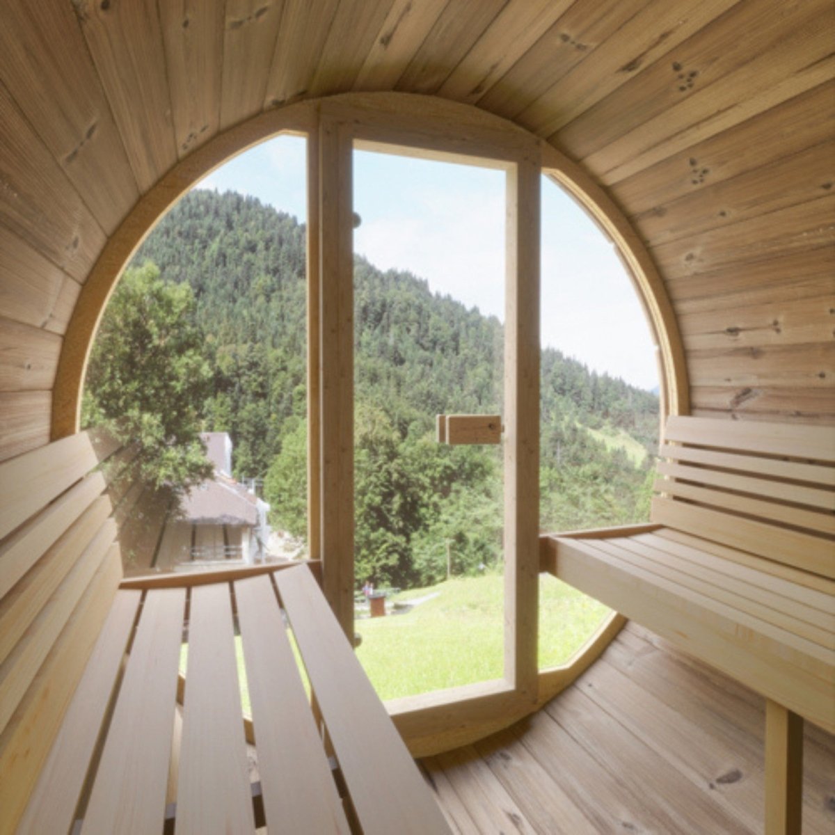 SaunaLife E8G sauna interior with full glass front and scenic outdoor landscape view.
