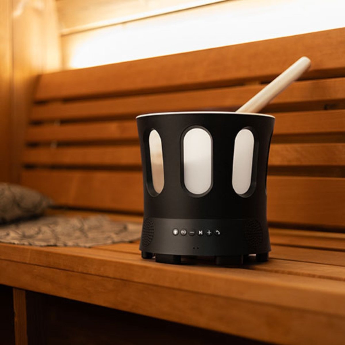 Side view of the SaunaLife SaunaZone speaker bowl on sauna bench.