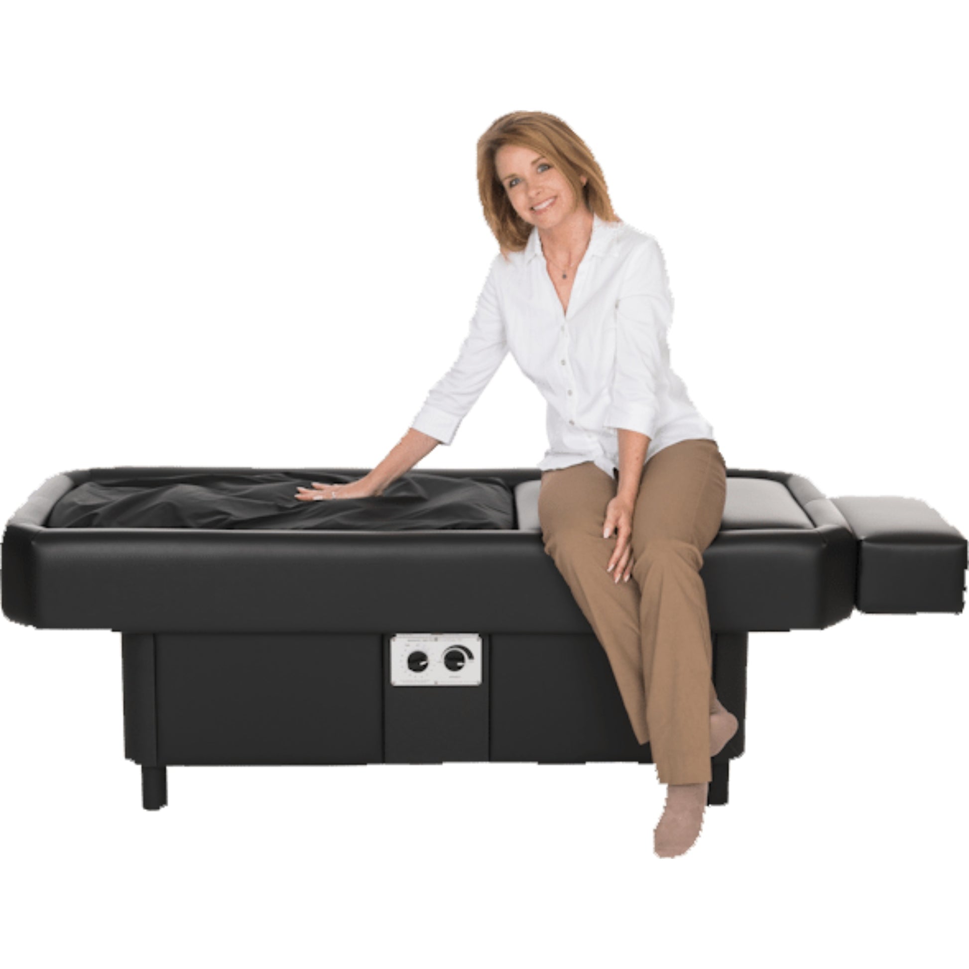 Woman standing next to Sidmar Hydrotable demonstrating replacement liner use