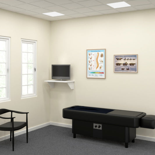 Sidmar Hydrotable with instructional poster mounted in professional clinic setting