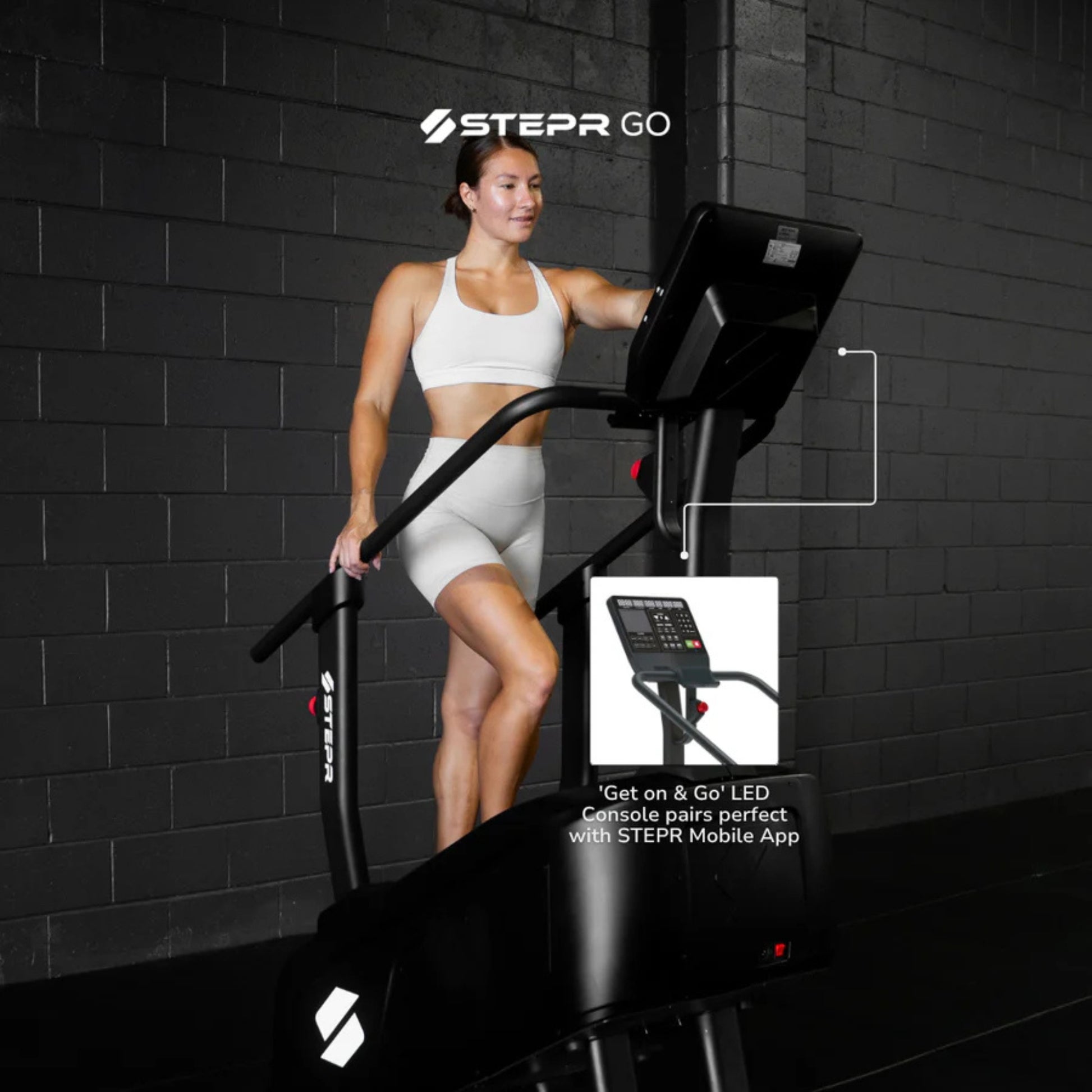 Woman using home stair climber fitness machine during standing workout