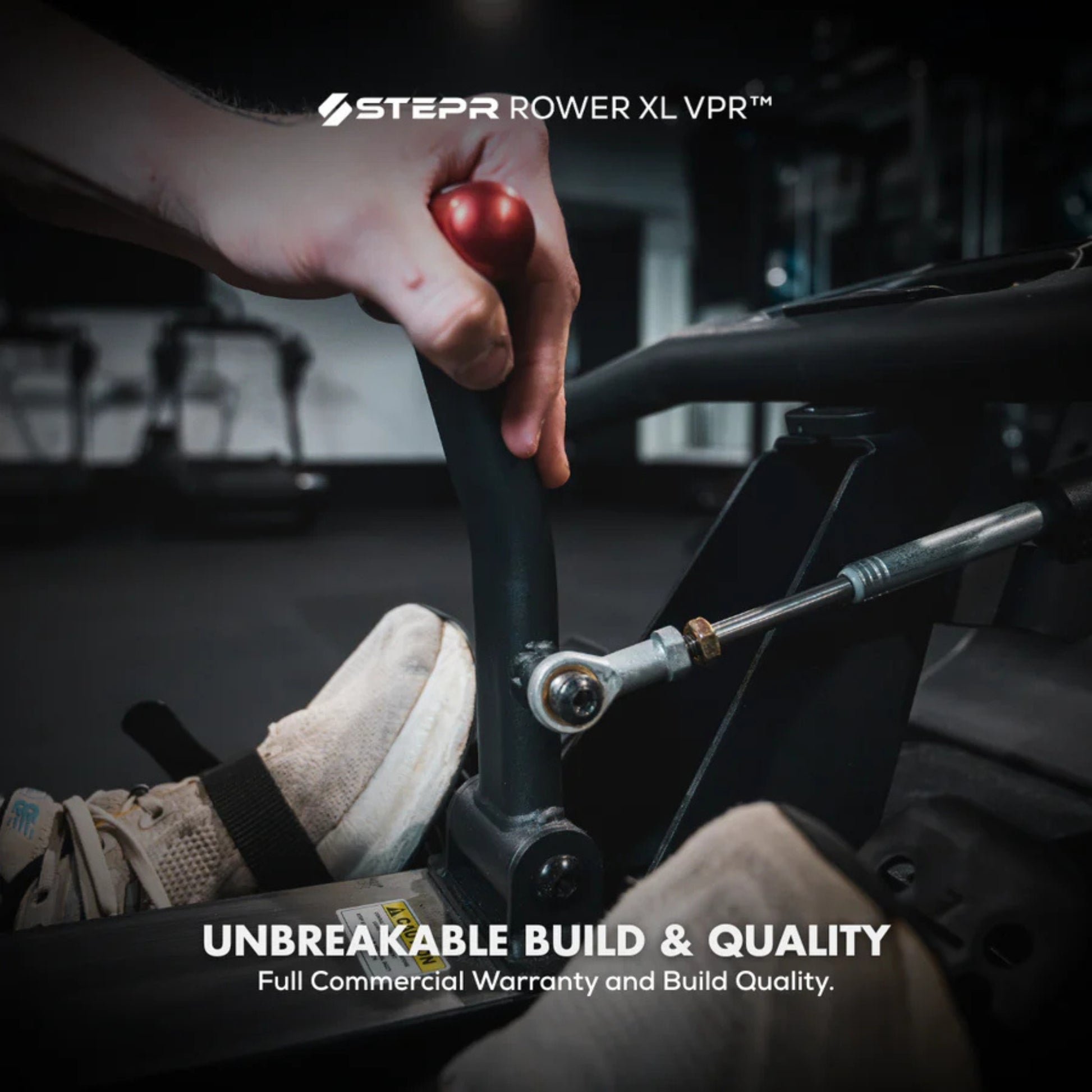 Close-up of STEPR rowing machine resistance control knob for adjustments