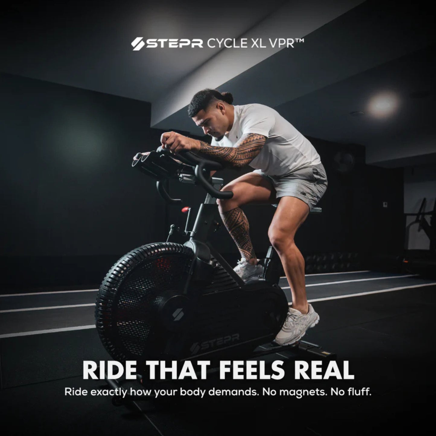 Athlete sprinting on STEPR spin exercise bike for high-intensity cardio