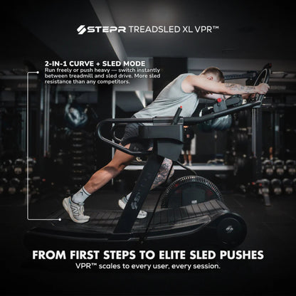 Athlete running on STEPR treadmill in lifestyle fitness studio setting