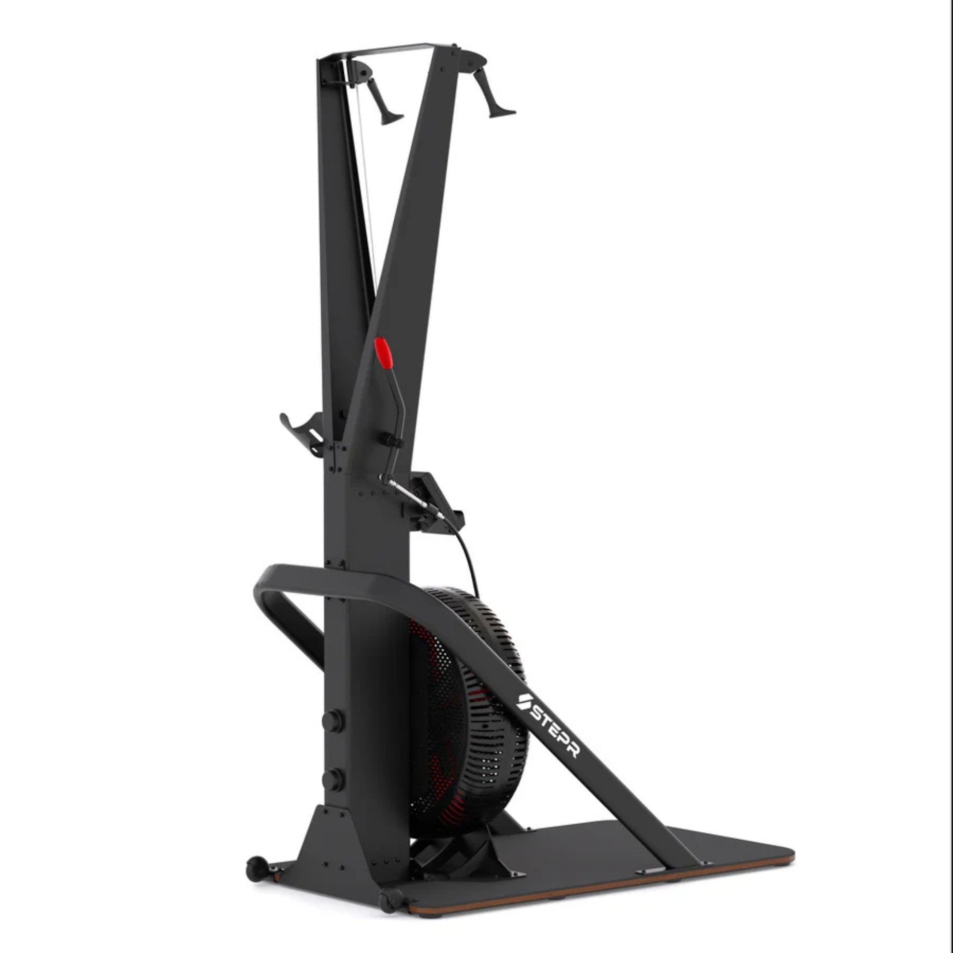 Athlete performing intense workout on STEPR vertical climber in studio