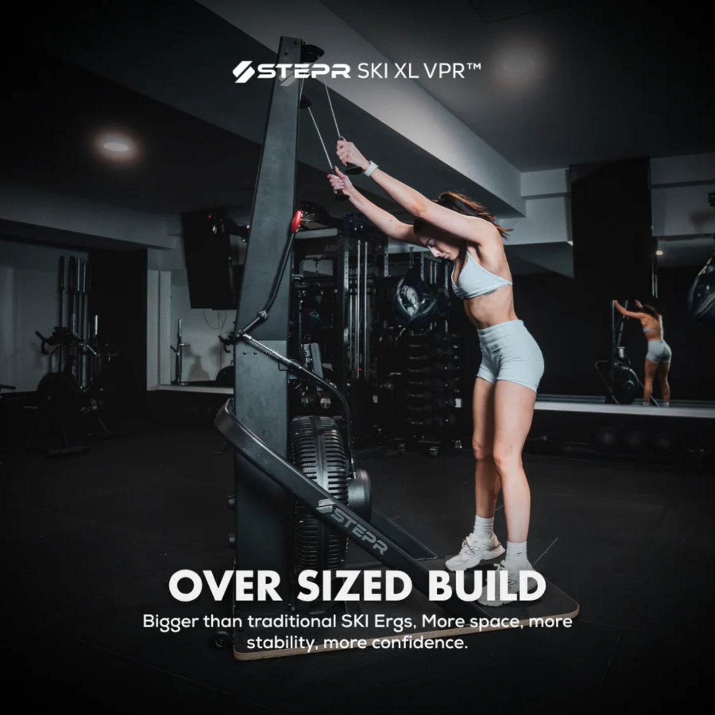 Oversized guide handlebars on STEPR vertical climber for stability and grip