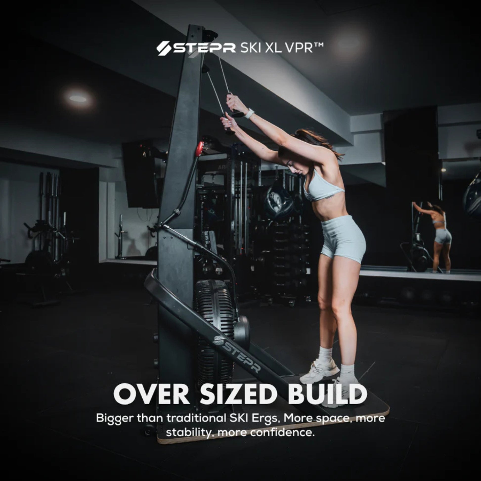 Oversized guide handlebars on STEPR vertical climber for stability and grip