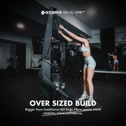 Oversized guide handlebars on STEPR vertical climber for stability and grip