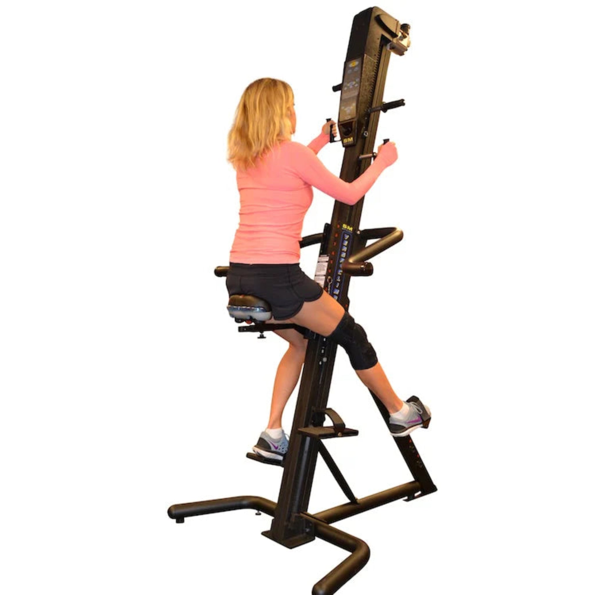 Woman training on the VersaClimber SRM Sport Rehab Model, performing seated rehabilitation exercises for safe, low-impact cardio and strength recovery.