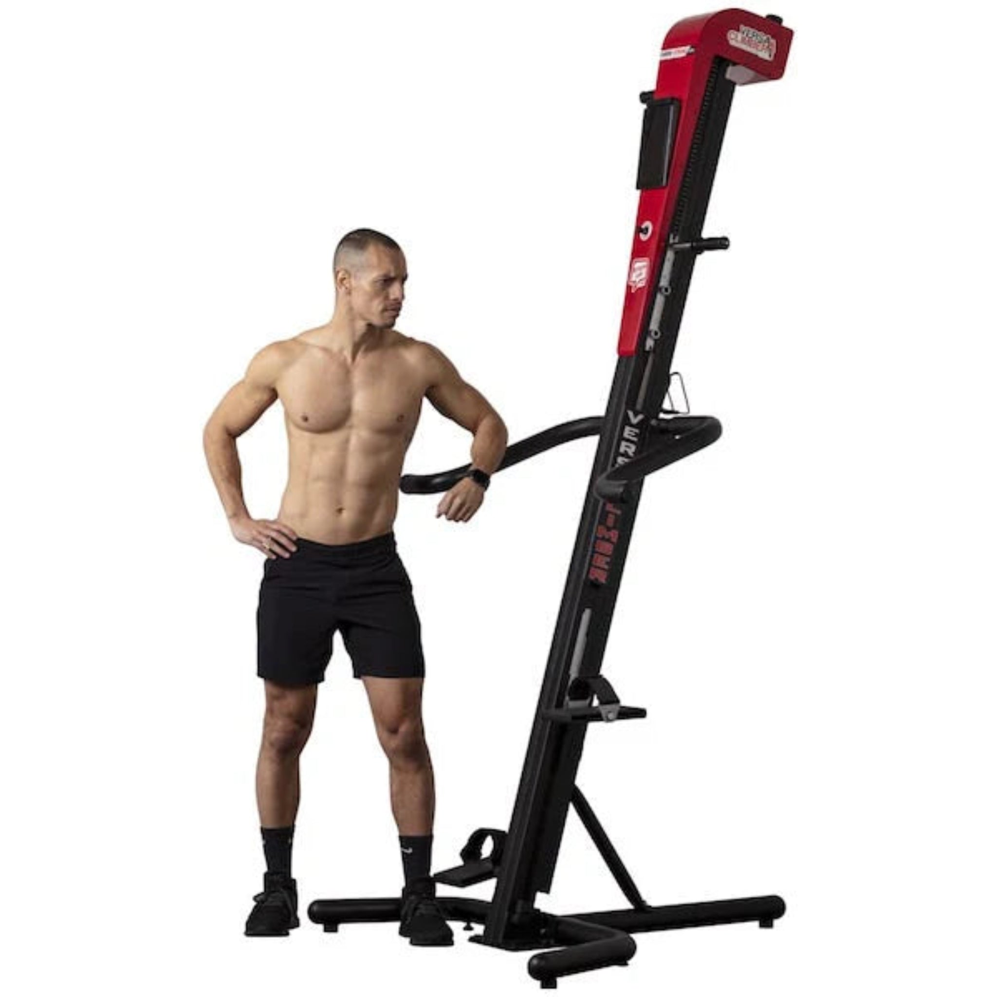 Man standing next to the VersaClimber TS-A Aerobic vertical climbing machine, designed for full-body zero-impact cardio training.